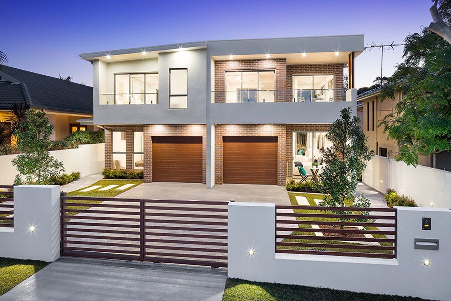 Modern duplex facade at dusk